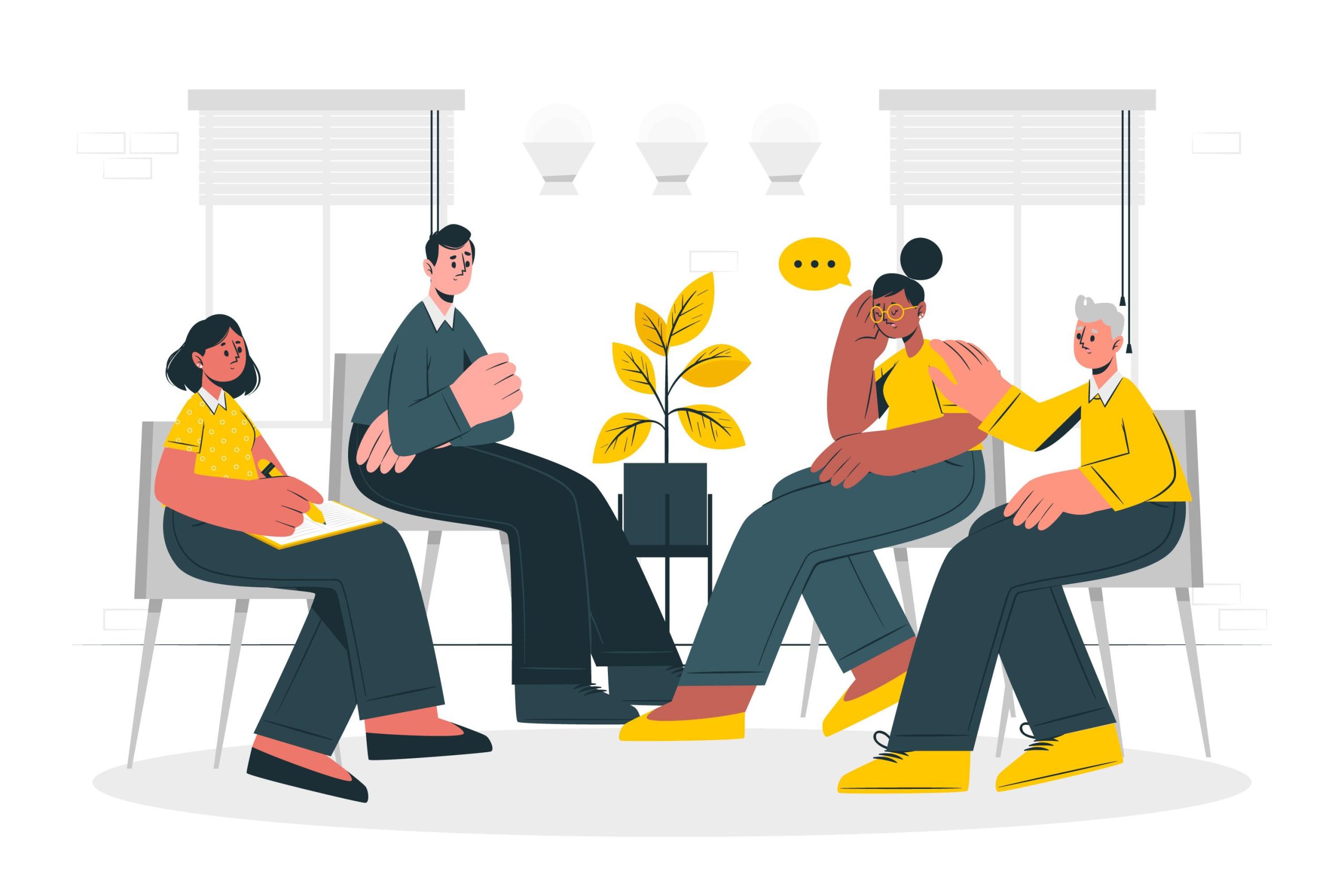 A diverse group of five people sit in a circle, engaging in a discussion. A plant is centered between them.